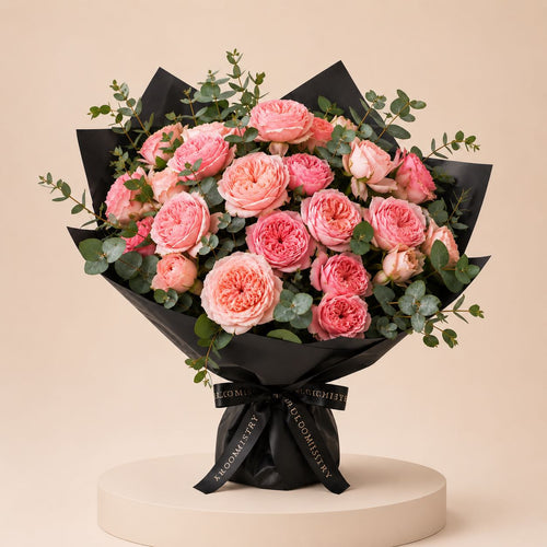 Dolce Velvet Bouquet — pink garden roses in matte black wrap by Bloomistry
