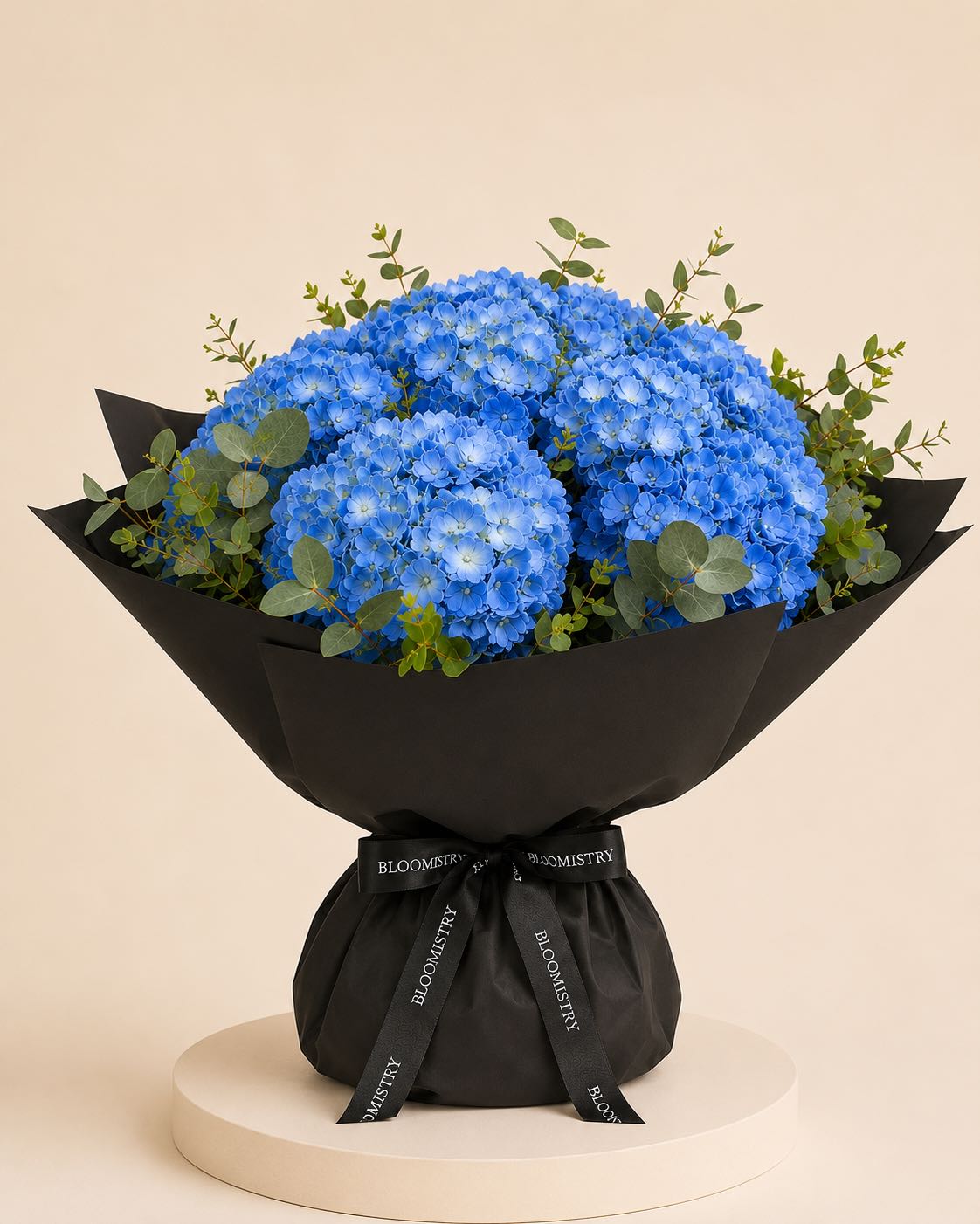 Blue Hydrangea in black wrapping