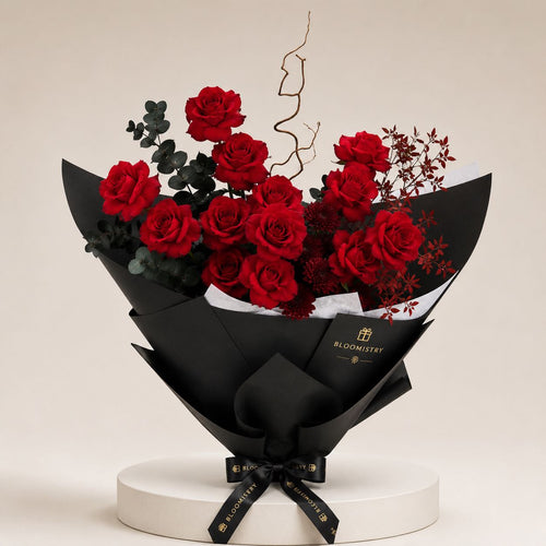 Crimson and Burgundy Dramatic Arrangement — fresh flower arrangement delivered across the UAE by Bloomistry
